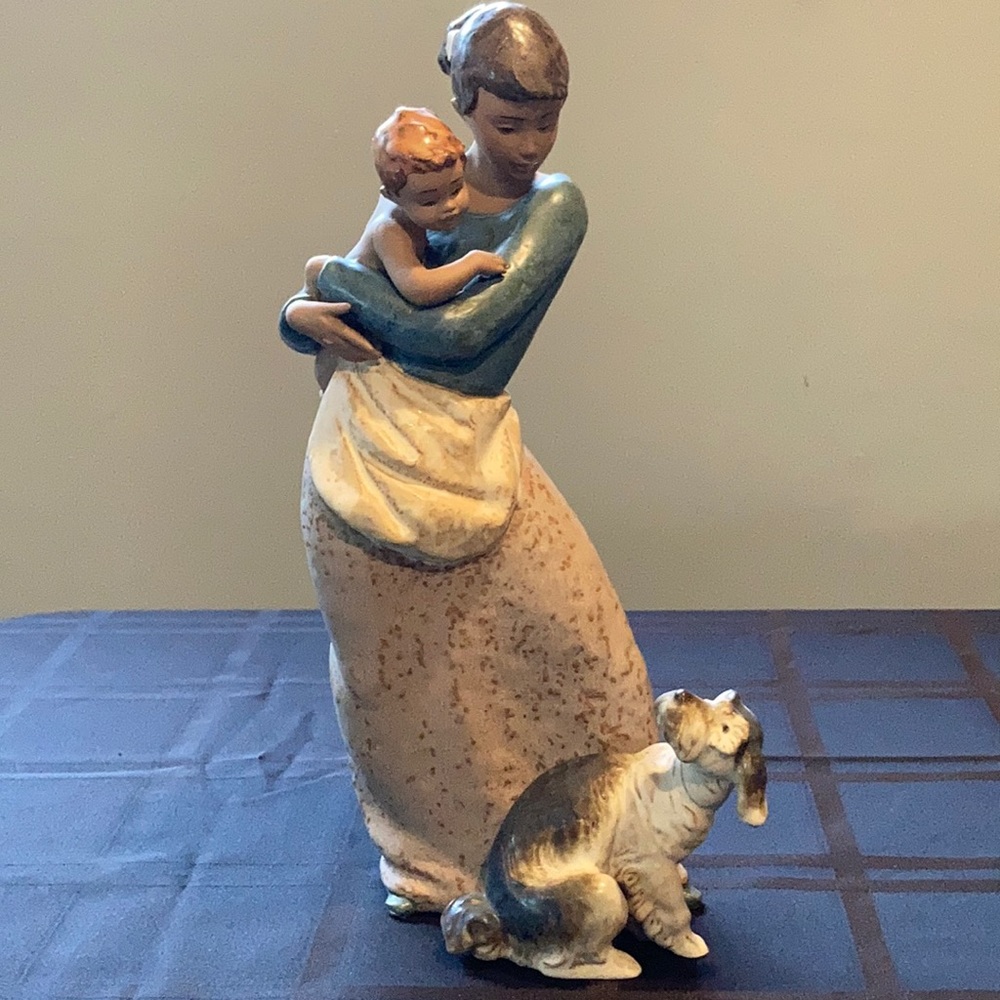 Lladro Woman with baby and dog figurine